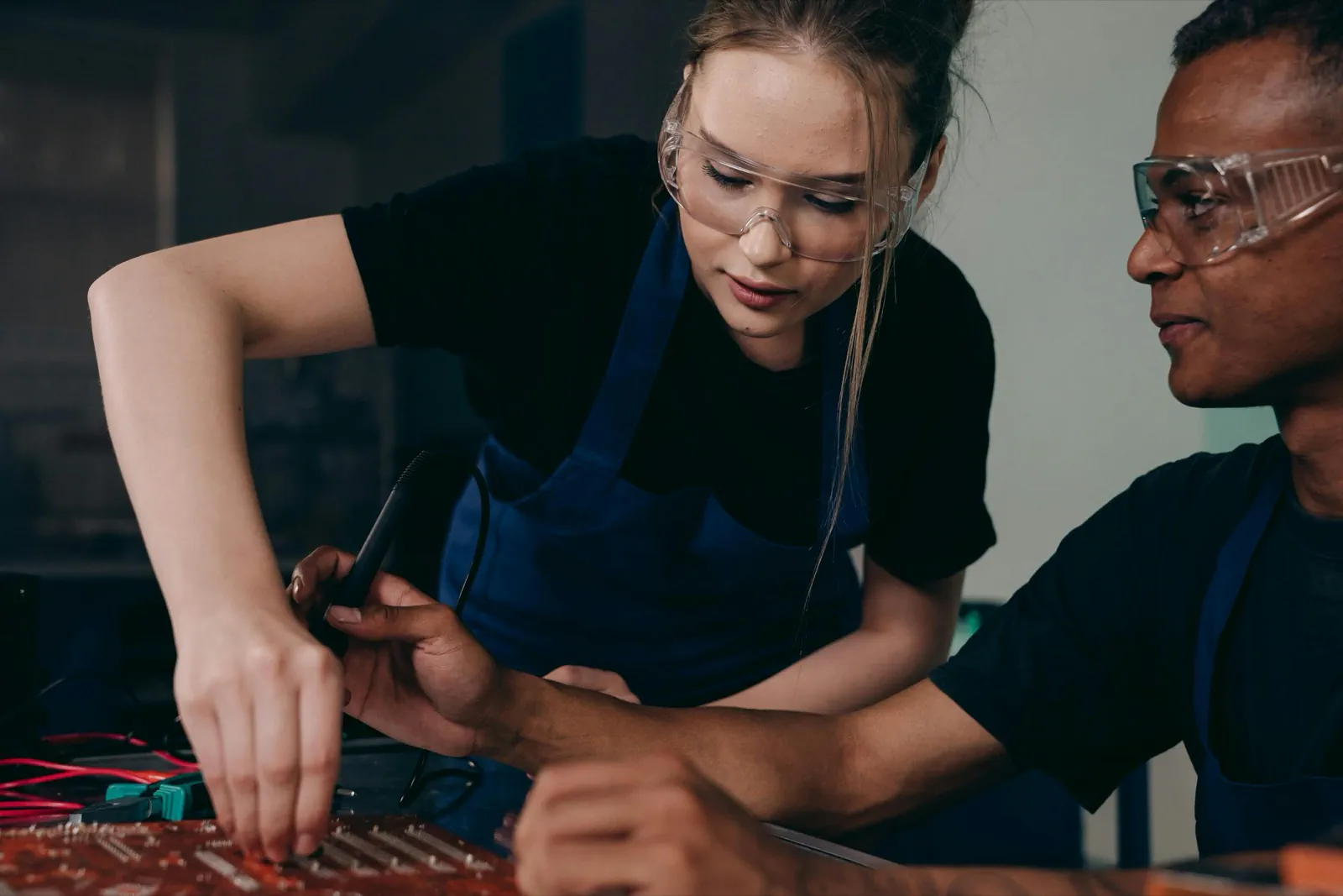 Technician servicing industrial controls